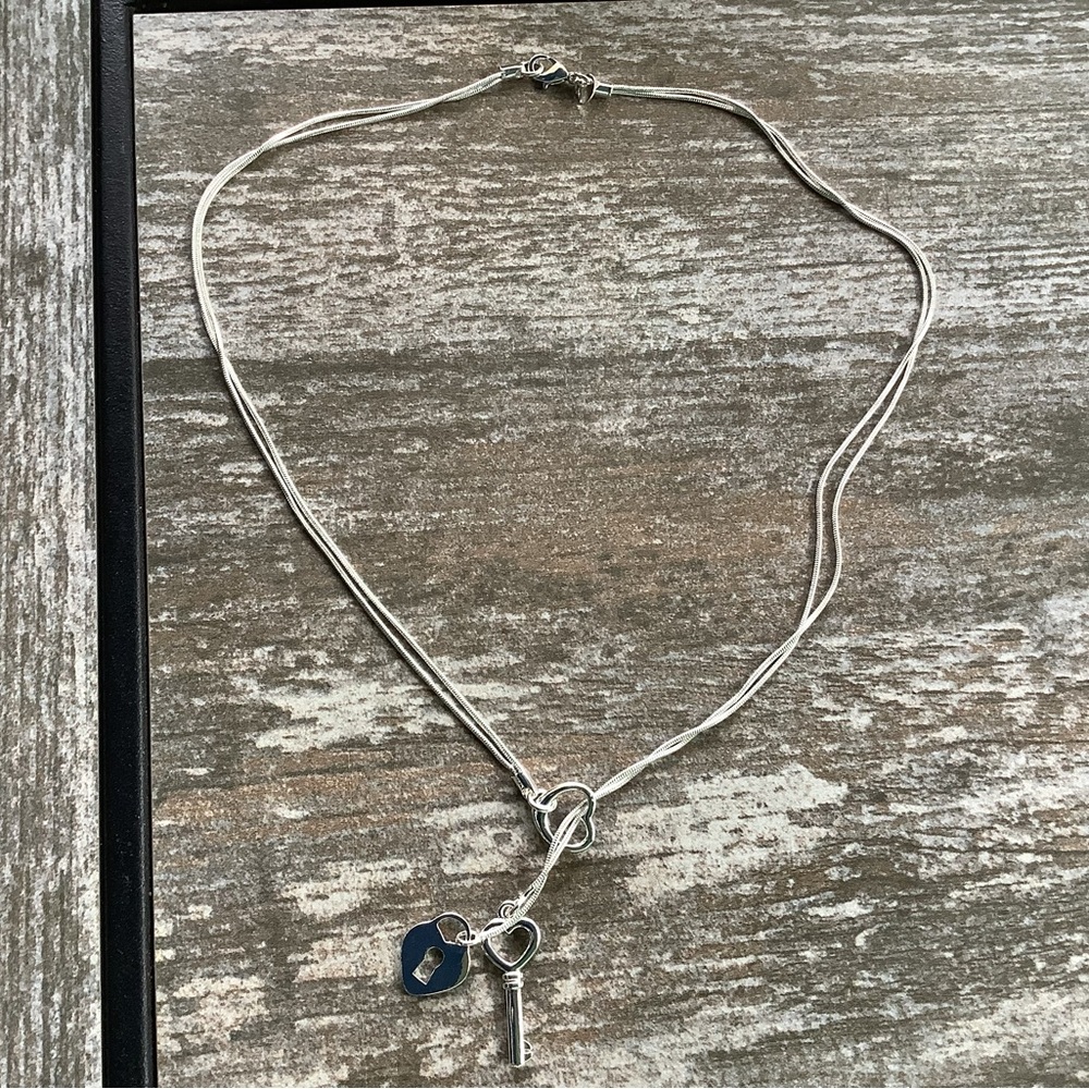 NWT, Sterling Silver Lock n Key through a heart necklace. - Picture 4 of 12